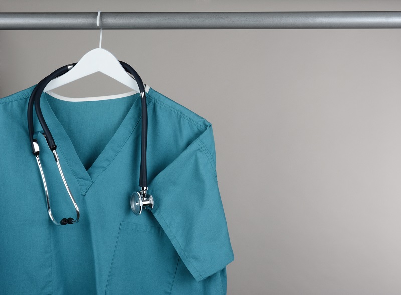 Scrubs on hanger with stethoscope