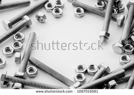 SS-Fasteners-screws-stainless-nuts-and-bolts-on-white-background-top-view-picture-space-for-text-message-flat-1087019561.jpg